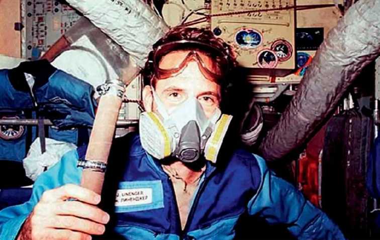 Jerry, an American astronaut wearing a breathing mask 