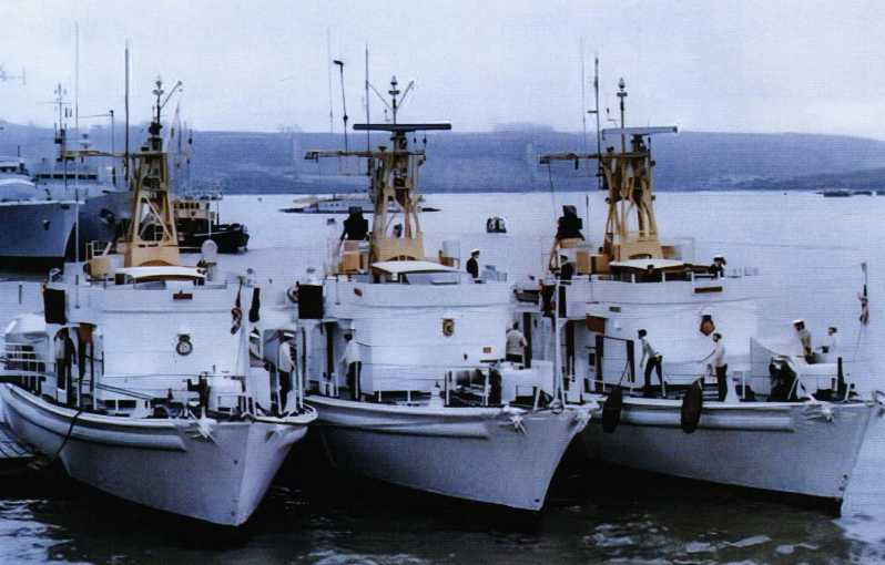 In 1962, three Echo-class oceanographic survey boats were docked side by side in Plymouth Harbor, from left to right, they are 