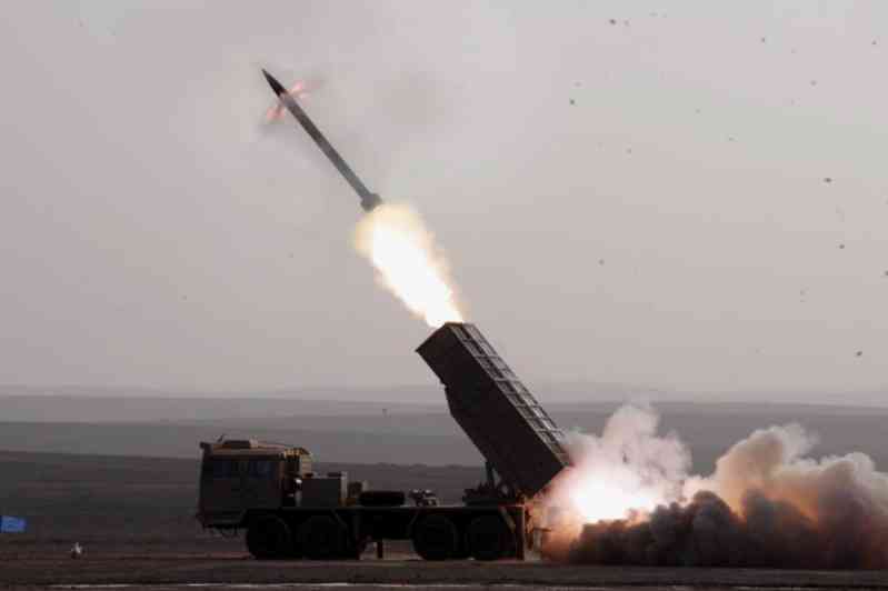 At the moment of WM80 rocket launcher firing, you can see the flame at the inclined nozzle behind the warhead 