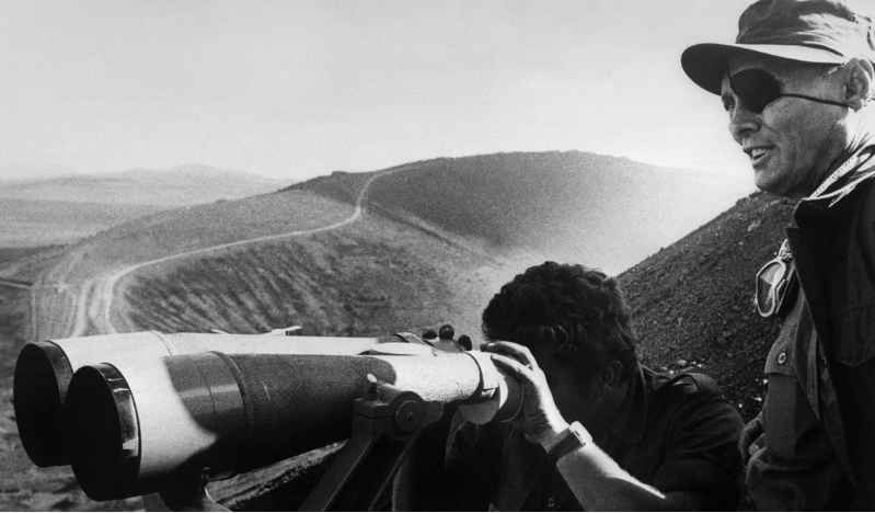 Dayan, the Israeli defense minister, inspecting the front line 